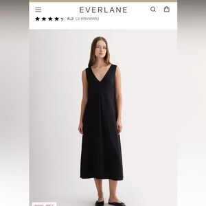 Excellent quality, never worn V-neck black dress
